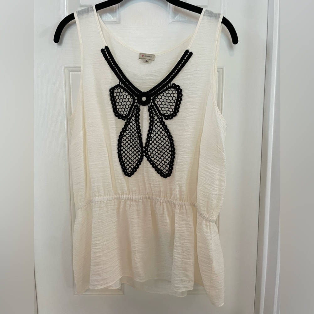Women’s Cream Sleeveless Top with Black Crochet Bow Detail